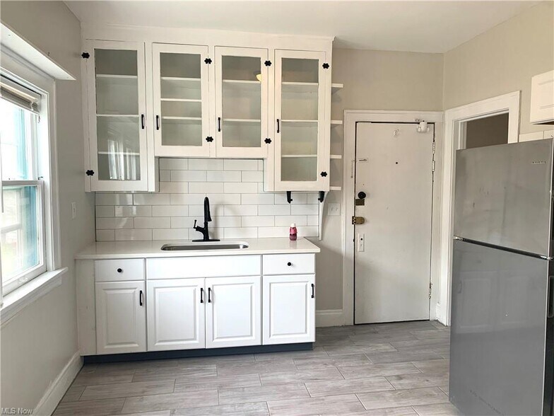 Recently remodeled cabinets and sink - 2104 W 10th St