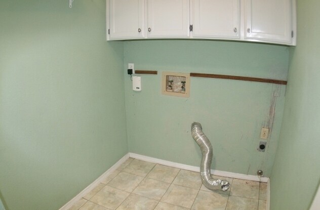 Building Photo - Brick 3 Bedroom Home! Stunning Backyard! M...