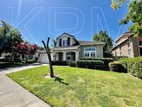 Building Photo - 5879 Riverbank Cir