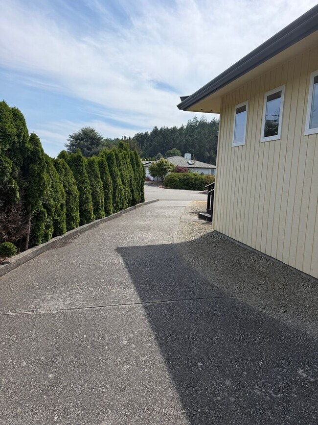 Building Photo - Luxury Coastal Living in Prestigious Shelter Bay – Immaculate 2 Bedroom Executive Residence