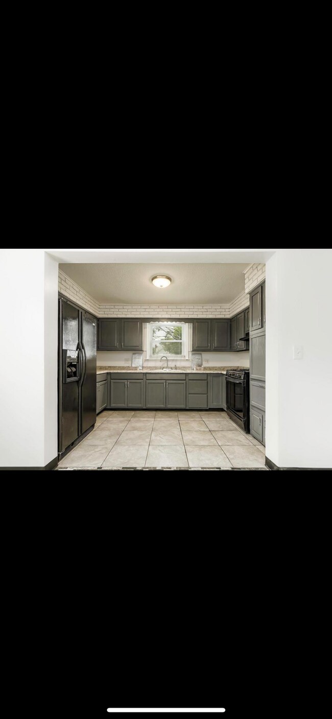 Building Photo - 1246 E 22nd Ave