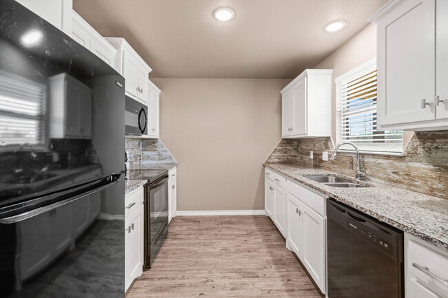 Building Photo - Modern Build with an Updated Interior