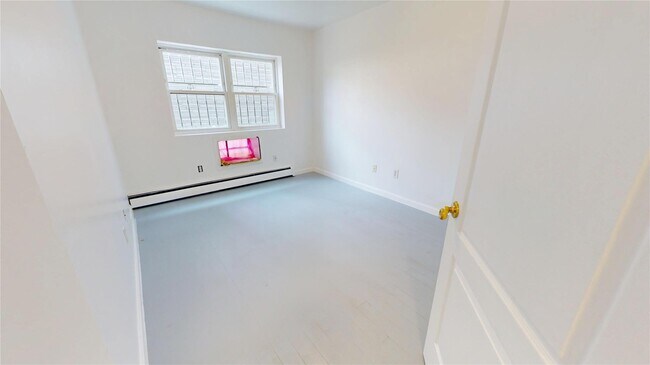 Building Photo - 15-41 125th St