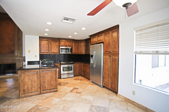 Building Photo - 10575 E Mission Ln