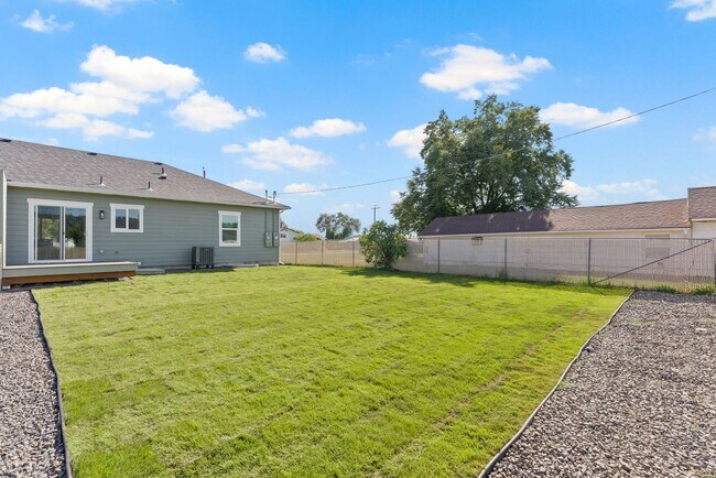 Building Photo - Newly built 4 Bedroom Duplex With Garage