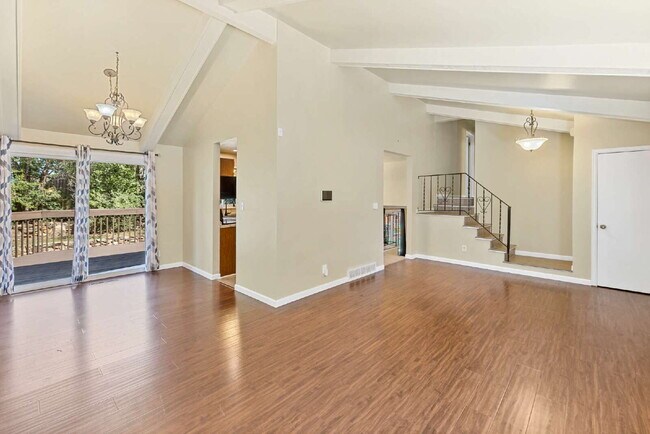 Building Photo - 3-Bedroom with A Flex Room Multi-Level Home with Fresh Paint, Refreshed Deck, and Multiple Living...