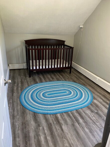 One bedroom, other bedroom is same size. Master is larger with shower and sink in bedroom - 694 Ten Rod Rd