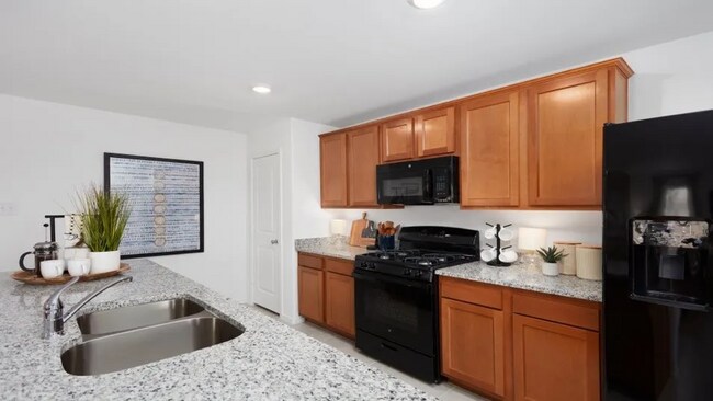 Building Photo - This single-story home offers a great layout with a total of four bedrooms.