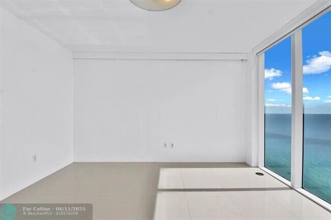 Building Photo - 16699 Collins Ave