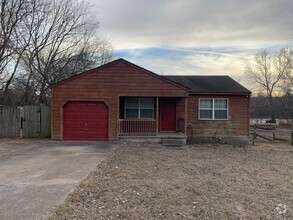 Building Photo - This rustic 2 bedroom cabin is 2.5 miles f...