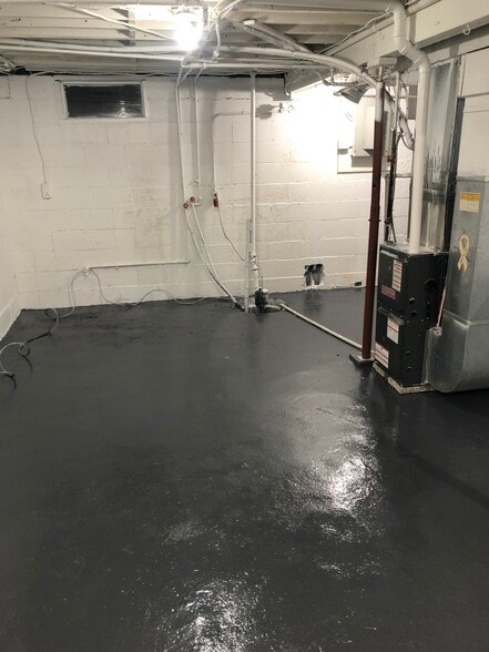 basement with washer dryer hook up , machines not provided - 51539 Pond St