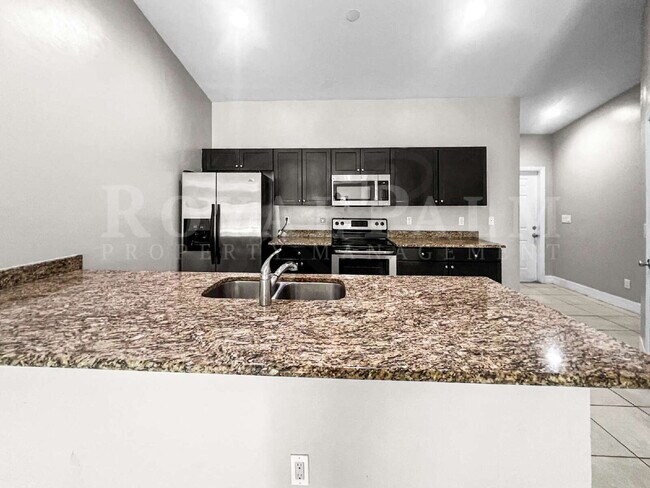 Building Photo - 3BR/2BA Cape Coral Rental - Washer... Dryer... Screened Lanai... This One Came Prepared