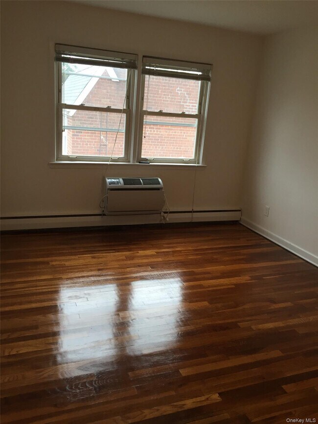 Building Photo - 60-46 69th Pl