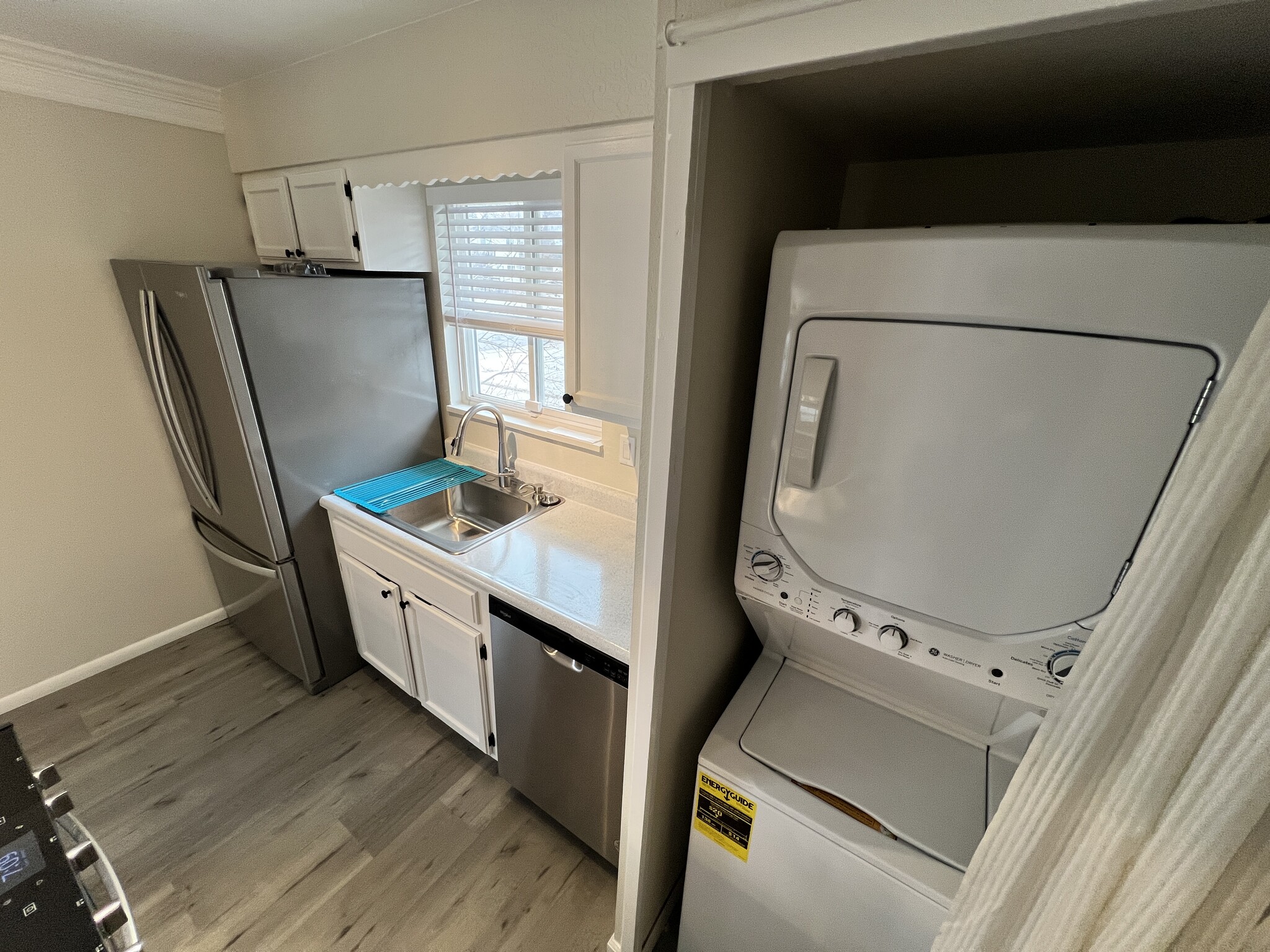 New single bowl sink, large full size fridge and stacker washer/dryer - 6650 E Arizona Ave