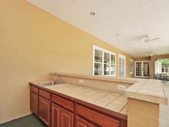Building Photo - IMMACULATE 2nd Story condominium with so m...