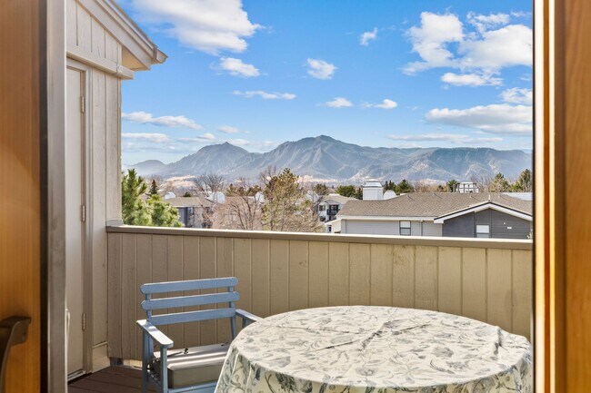 Building Photo - Flatiron View Retreat with Vaulted Ceilings & Private Balcony