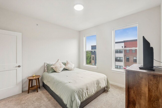 Building Photo - The Julianne is modern, functional, and full of charm—don’t let it get away!