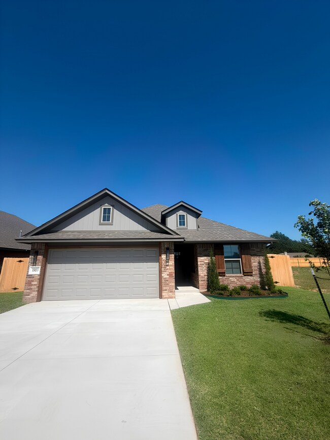 Building Photo - Spacious 4-Bedroom Home with 3-Car Garage in Yukon!