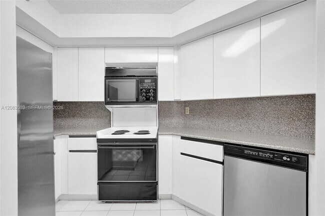 Building Photo - 6767 Collins Ave