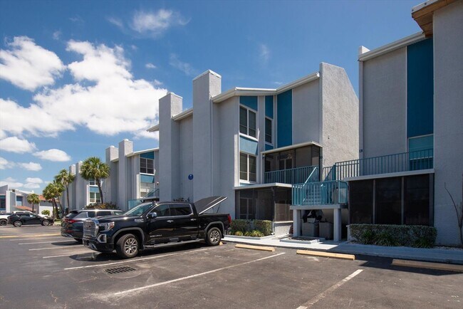 Building Photo - Gated Waterfront Community  1-Bedroom 1.5 ...