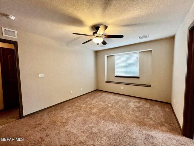 Building Photo - 12777 Tre Maximiliano Ave