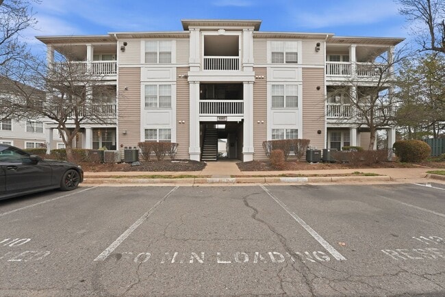Building Photo - Bathed in natural light, this stunning second level condominium offers an effortless blend of com...