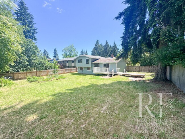 Building Photo - Spacious Poulsbo Home with Large Basement, Fenced Yard & Garden Space
