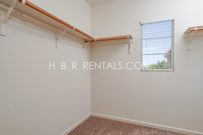 Building Photo - Questa Village: Spacious 3-Bedroom Retreat...