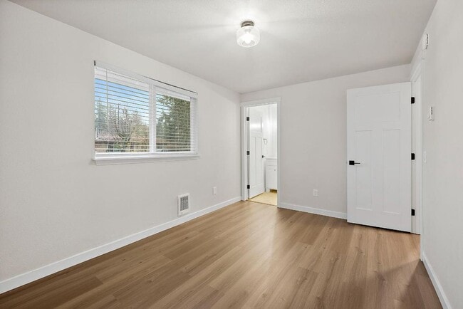 Building Photo - Light & Airy 2-Bedroom Olympia Home with Private Baths & Spacious Backyard!