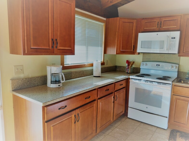 2nd floor kitchen with quartz countertops and new appliances - 3 Dubois Dr