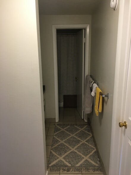 Upstairs bath includes double vanity, door to toilet, shower/tub combo - 3000 Colorado Ave