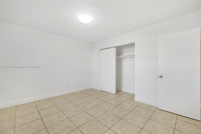 Building Photo - 7130 W 11th Ct