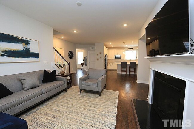 Building Photo - Main Floor Owner's Suite PLUS Main Floor G...