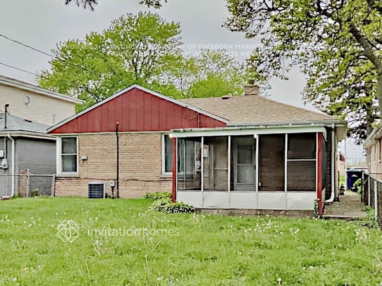 Building Photo - 8925 S Utica Ave