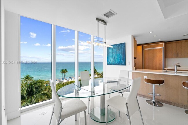 Building Photo - 10275 Collins Ave