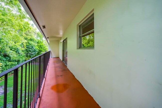 Building Photo - 3100 Coral Springs Dr