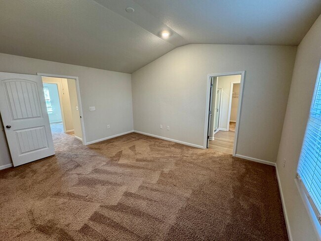 Building Photo - Located in Creedmore Hills a 4BR/2.5BA home with 2 car garage