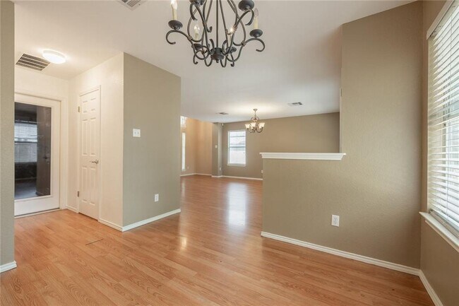 Building Photo - No Carpet! Tons of Space! Beautiful backyard with large covered patio!