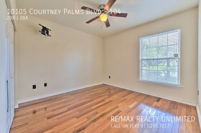 Building Photo - 10105 Courtney Palms Blvd