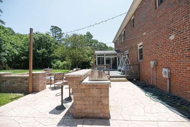 Building Photo - Spacious & Striking 3-story brick Executive 4 bedroom 4.5 bathroom home in Oak Ridge NC + Lawn ca...