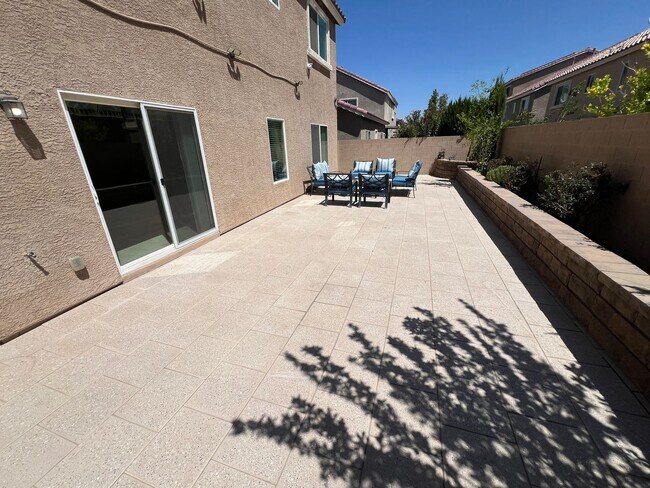 Building Photo - A Fantastic 4 Bedroom Home with the primary Downstairs, in Silverado Ranch