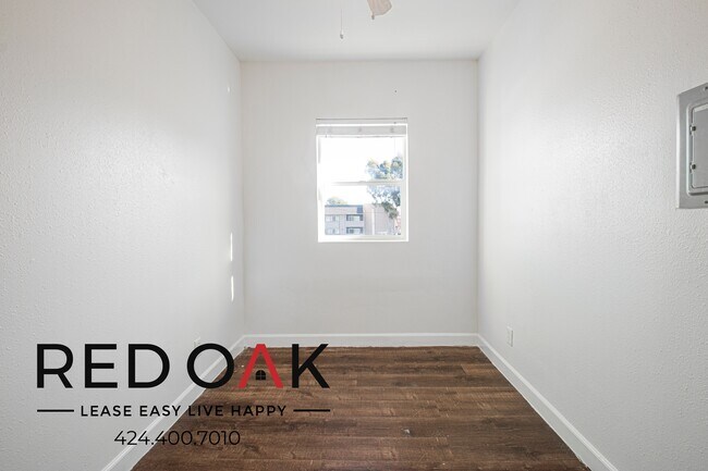 Building Photo - 1847 1/2 W Florence Ave