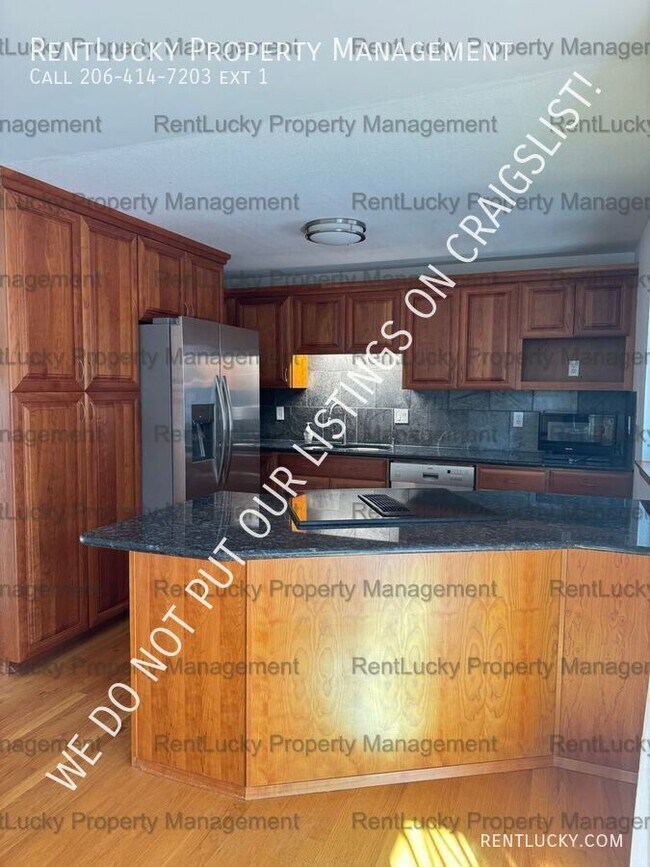 Building Photo - 6718 23rd Ave SW