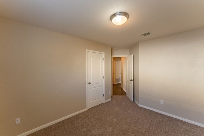 Building Photo - Charming Brick Home with Open Floorplan, Vaulted Ceilings, and Luxurious Amenities—Perfect for An...