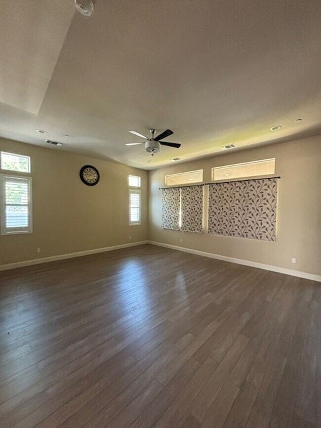 Building Photo - Elegant 4-Bedroom Home with Paid Solar in Gated Village Green Community