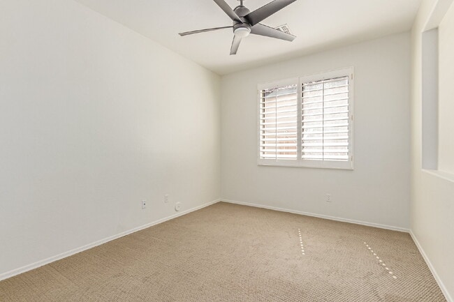 Building Photo - "Charming 2-Bedroom + Den Oasis with Spaci...