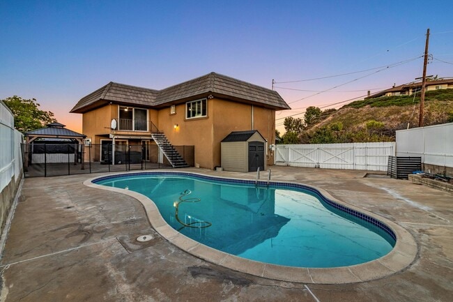 Building Photo - 4 Bedrooms, 3 Bathroom, Two Story Home With Pool