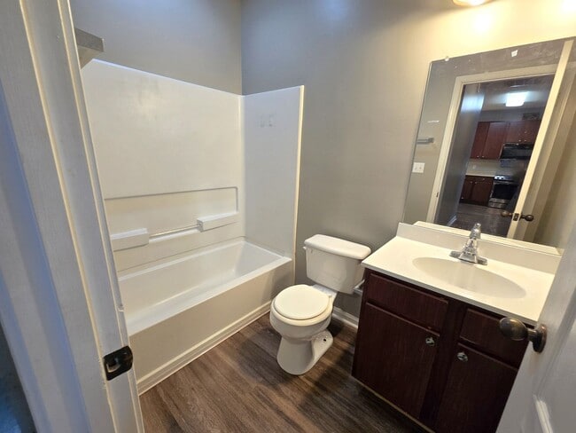 Building Photo - Rent INCLUDES water/sewer and yard maintenance.