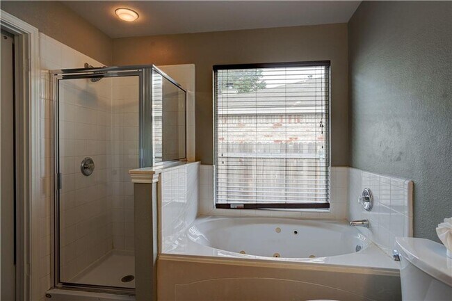 Building Photo - Charming One-Level 4 Bedroom Home with 2-C...