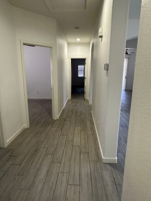 Building Photo - Outstanding 3 Bedrooms, 2 Baths, 2-car garage all on one level duplex separated by a 30-foot cour...